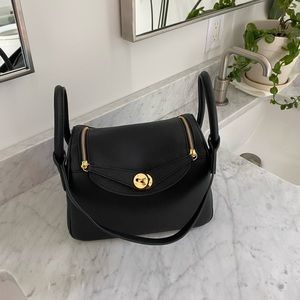 Designer inspired genuine soft Togo leather bag. Black with gold hardware